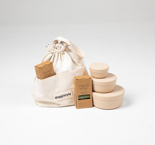 Dog food cooler travel bag & dog food storage containers in blue plus compostable poop bags.